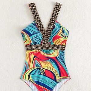 Sexy VIBRANT one piece women’s bathing suit with amazing detail 🤩